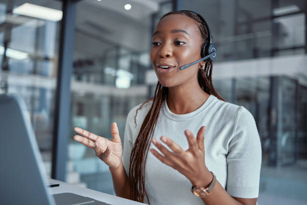 Business professional using VoIP phone system
